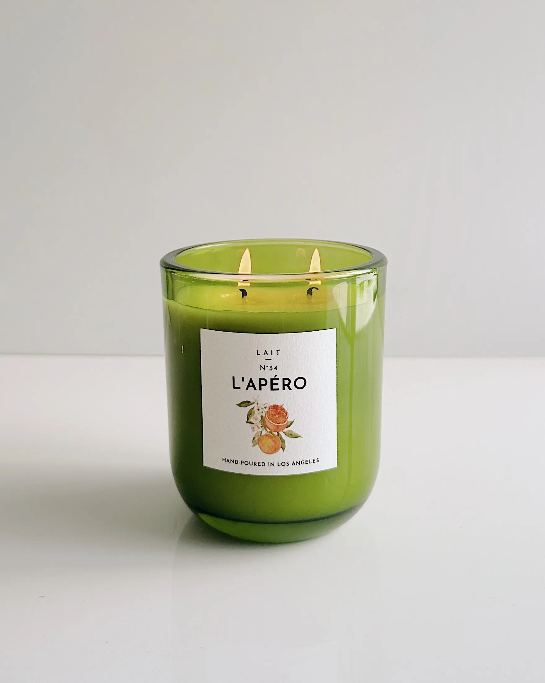 N°34 L’APÉRO (APEROL SPRITZ CANDLE) 2-WICK CANDLE SHOP LAIT