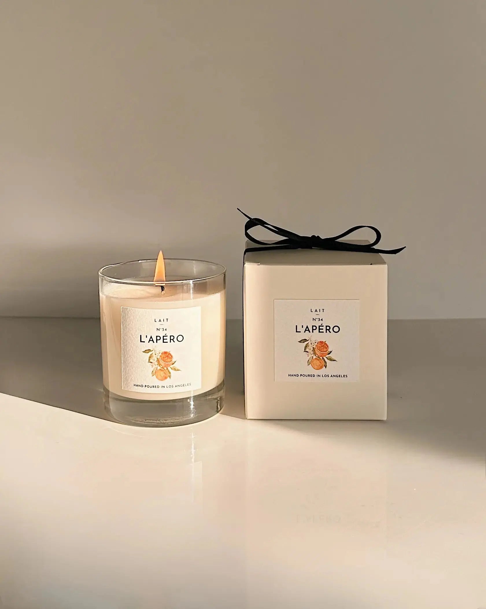 N°34 L’APÉRO (APEROL SPRITZ CANDLE) SHOP LAIT