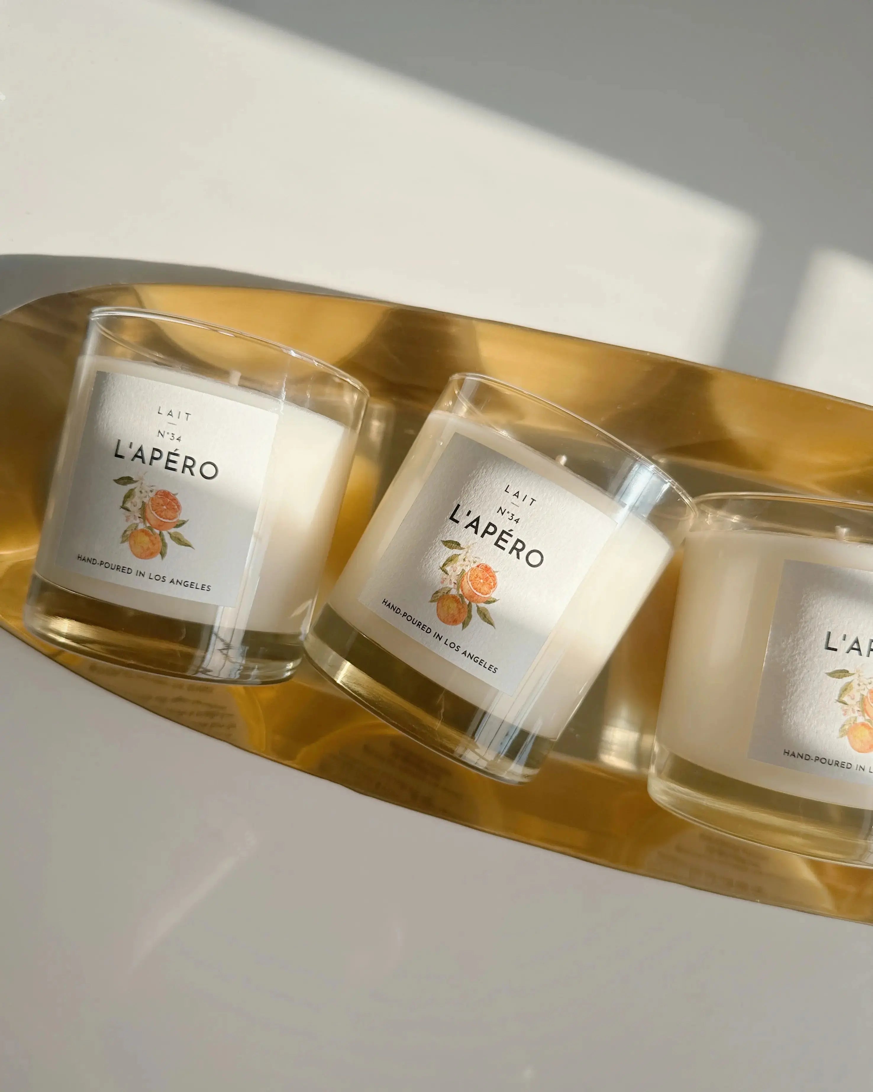 N°34 L’APÉRO (APEROL SPRITZ CANDLE) SHOP LAIT