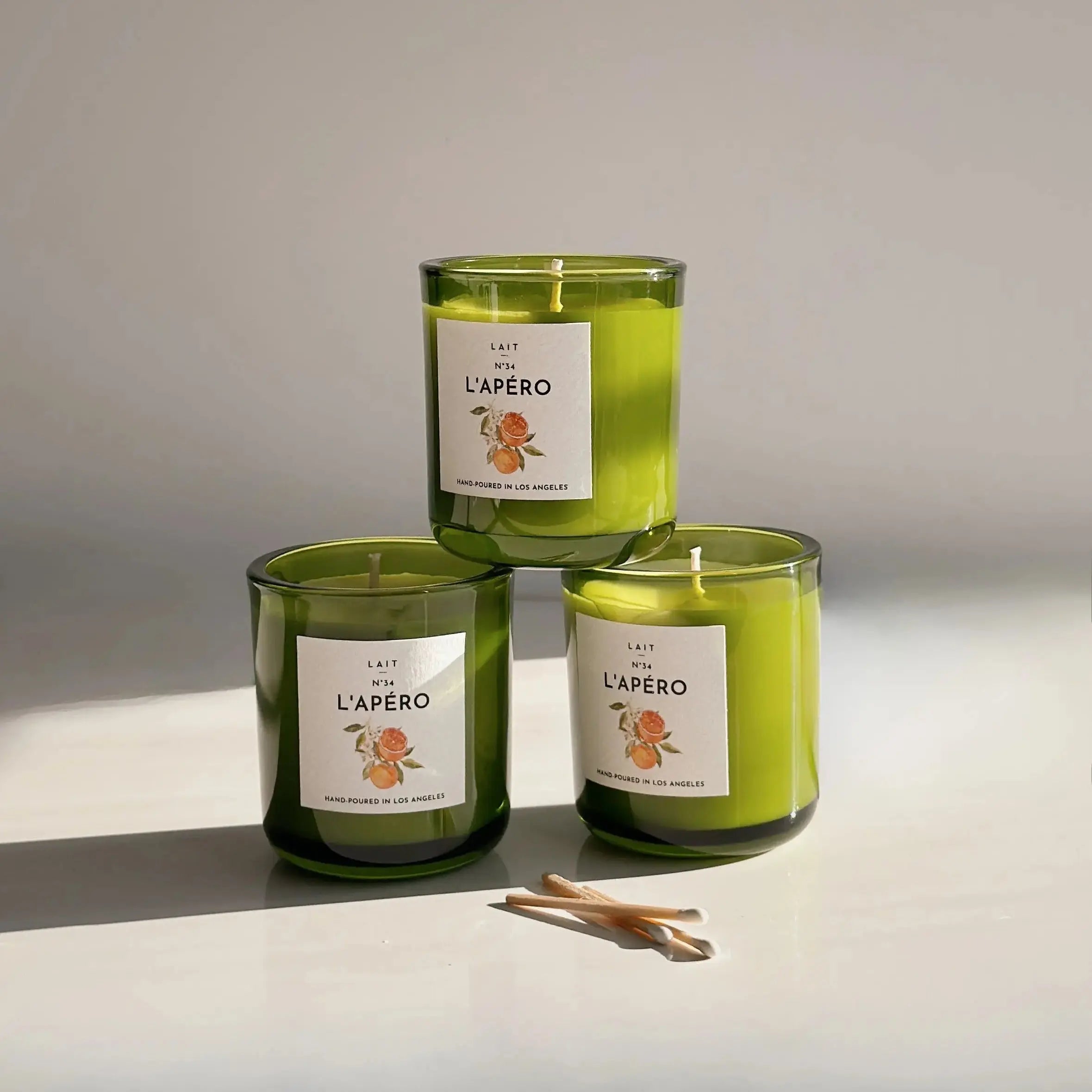 N°34 L’APÉRO (APEROL SPRITZ) PETITE BOXED CANDLE (3.5OZ) SHOP LAIT