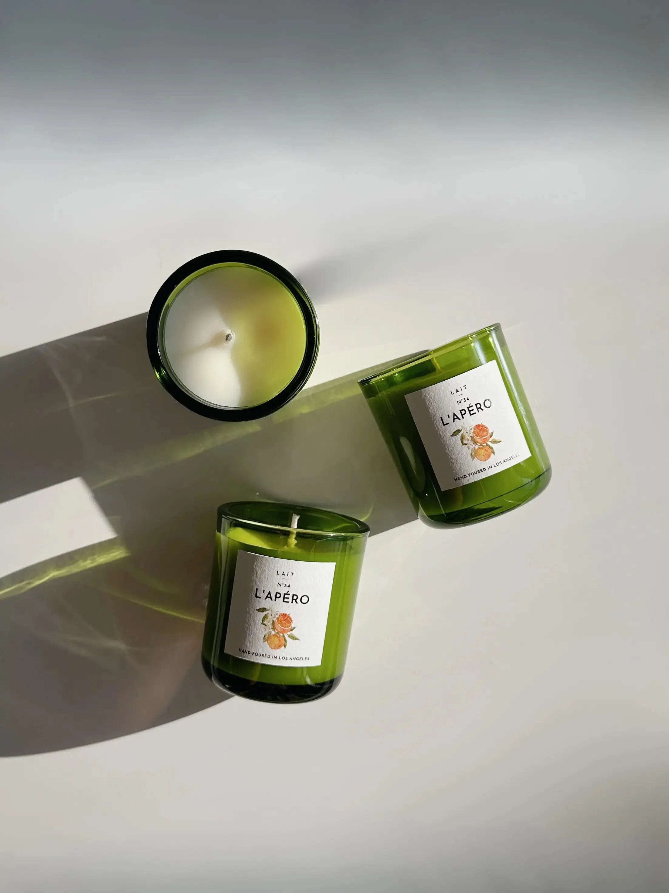 N°34 L’APÉRO (APEROL SPRITZ) PETITE BOXED CANDLE (3.5OZ) SHOP LAIT