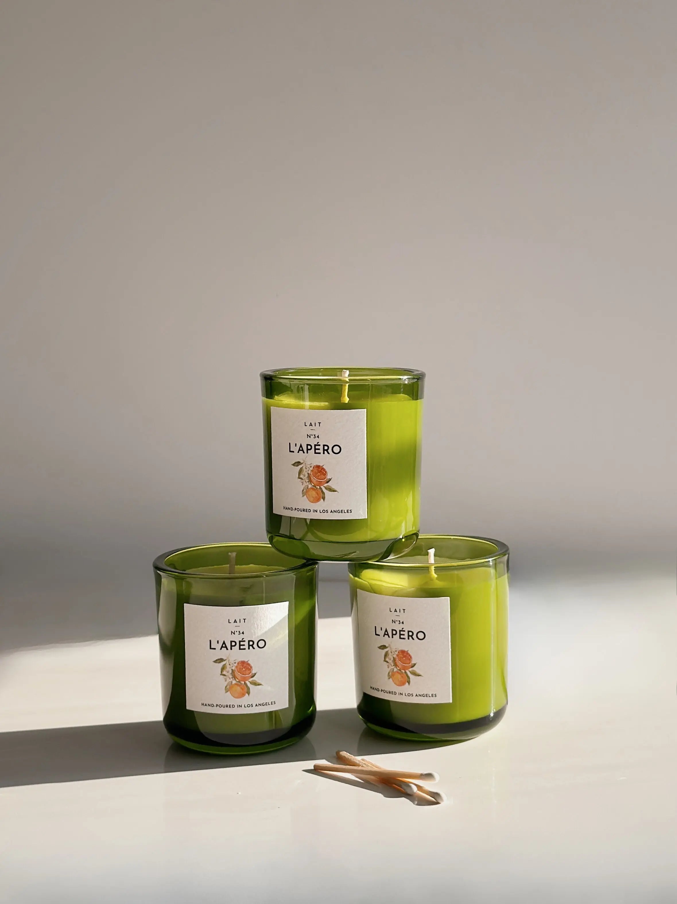 N°34 L’APÉRO (APEROL SPRITZ) PETITE BOXED CANDLE (3.5OZ) SHOP LAIT